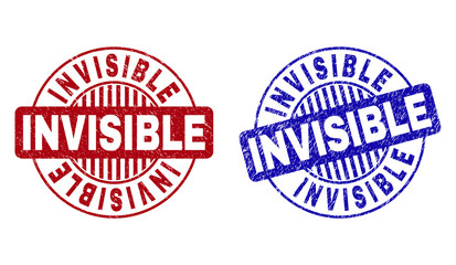 Grunge INVISIBLE round stamp seals isolated on a white background. Round seals with distress texture in red and blue colors. Vector rubber imprint of INVISIBLE caption inside circle form with stripes.