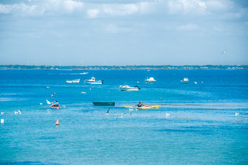 Man in his Kayak at sea in summertime on the isle of Noirmoutier