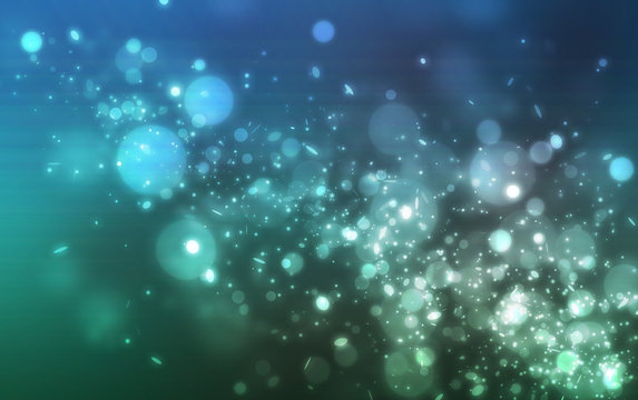 Blue and green glitter light floating from bottom scene wint bokeh on dark background