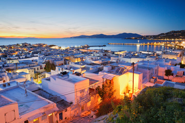 Fototapeta premium View of Mykonos town and Tinos island in the distance, Greece.