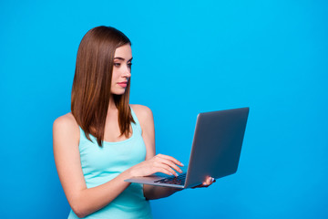 Fototapeta premium Close up side profile photo beautiful she her lady hold look texting writing notebook intelligent freelance working business woman wear casual jeans denim tank top clothes isolated blue background