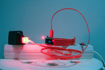 USB charger glows red wire.