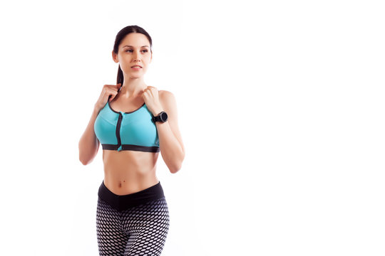 Fitness woman  ready for sports exercises wearing a smartwatch activity tracker. Fit girl living an active lifestyle