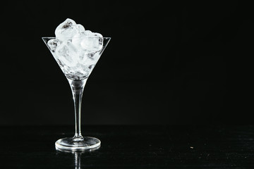 Martini glass full of ice.