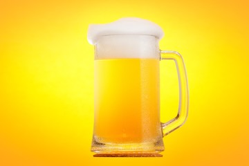 Golden beer in glass with foam, alcohol beverage,  light.