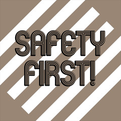 Conceptual hand writing showing Safety First. Concept meaning best avoid any unnecessary risks and act so that you stay safe White and Brown Stripes Alternately on Chocolate Background