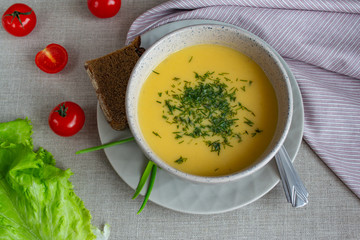 Lentil cream soup in a bowl on linen fabric. Dietary vegetarian food. Healthy food