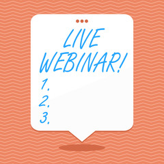 Conceptual hand writing showing Live Webinar. Concept meaning presentation lecture or seminar transmitted over Websites White Speech Balloon Floating with Three Punched Hole on Top