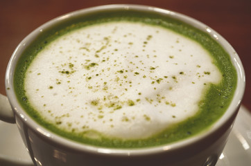 Matcha latte in a cup.