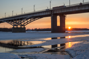 sunset over the river in winter