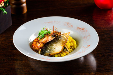 seafood risotto with mussel shrimp and squid , italian food