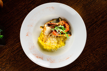 seafood risotto with mussel shrimp and squid , italian food in a restaurant