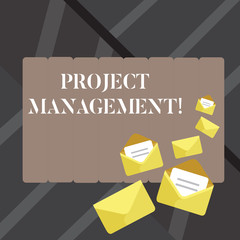 Text sign showing Project Management. Business photo showcasing practice of initiating planning controlling work team Closed and Open Envelopes with Letter Tucked In on Top of Color Stationery