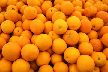 Orange fruits in supermarket.