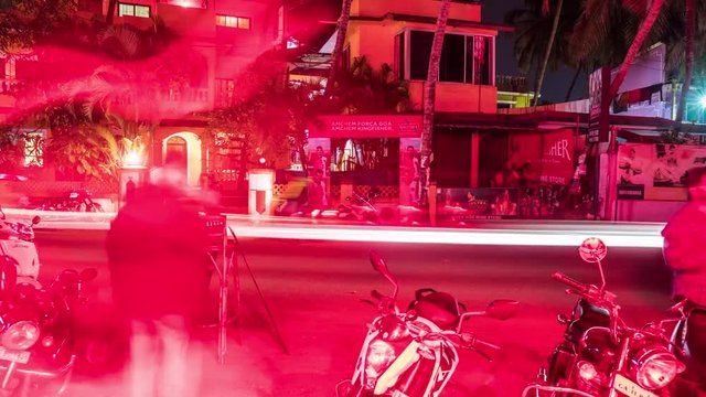 Timelapse of busy traffic and modern building in Goa