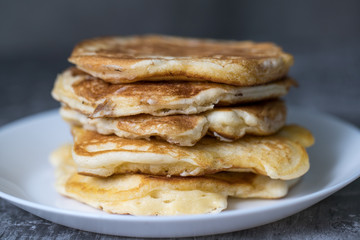 Pancakes on white plate