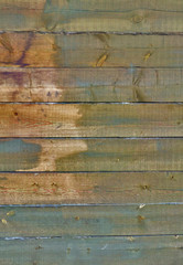 weathered fir planks on old fence, texture with vignette