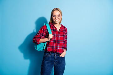 Portrait of her she nice lovely charming cute attractive winsome nerd content cheerful teen girl wearing checked shirt back to school isolated on teal turquoise bright vivid shine background - Powered by Adobe