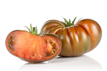Group of one whole one half of meaty fresh tomato primora isolated on white background