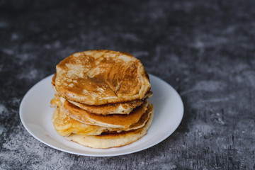 Pancakes on white plate