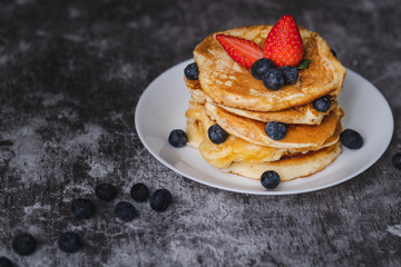 Pancakes on white plate