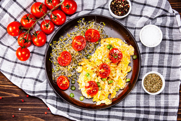 Breakfast - scrambled eggs with vegetables