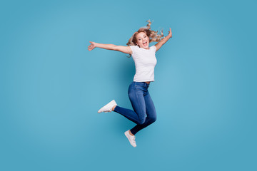 Fototapeta na wymiar Full length body size view portrait of nice lovely attractive cheerful cheery optimistic dreamy wavy-haired lady in casual white t-shirt having fun day isolated over blue background
