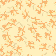 Fototapeta na wymiar Desert camouflage of various shades of orange, beige and yellow colors