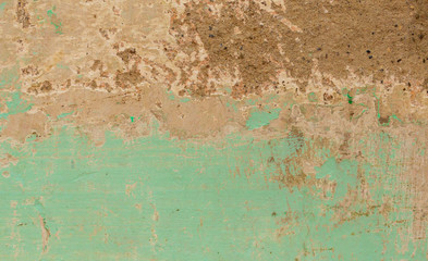 Old plaster on the wall of the house as an abstract background