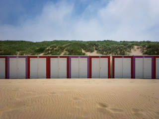 Naklejka premium Beach cabins at North Sea beach in Domburg, Zeeland, the Netherlands