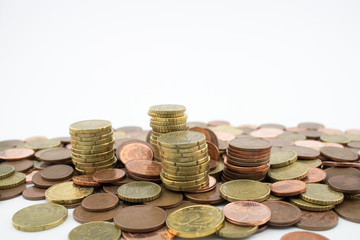 Stack of euro cents coins of different value on white background. Economy.