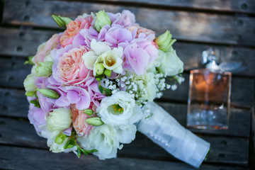 Beautiful bouquet of flowers on wooden chair