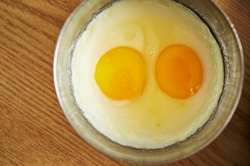 2 fried eggs in mold 