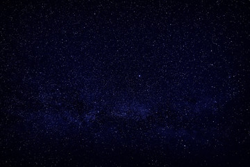 Bright stars in the night sky, view of open space.