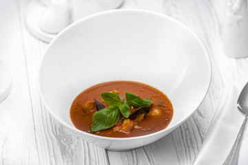 Tomato dipping sauce with vegetables in a bowl