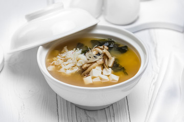 Nutricious fish soup with vegetables in a bowl
