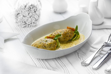Cutlets with tomatoes in a spicy sauce