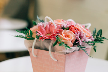 Beautiful flowers bouquet in a pink box, valentine, gift concept