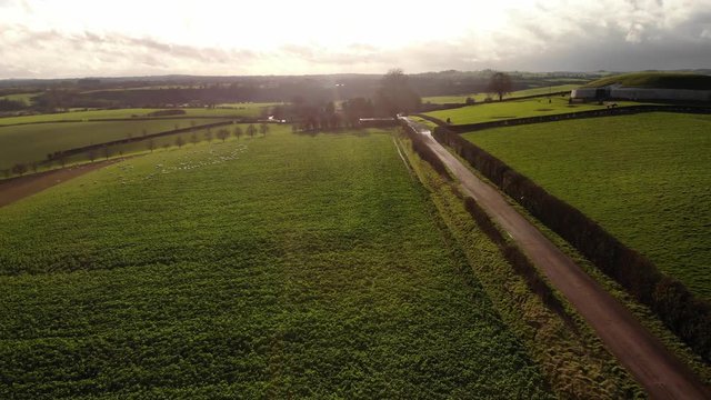 Flying at sunset light near the tombs at Newgrange