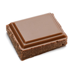 Milk organic chocolate pieces isolated on white background