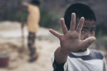 Child labor in building commercial building structures. World Labor Day concept