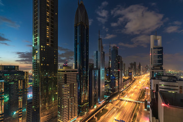 Fototapeta na wymiar Aerial view of cityscape at sunrise in Dubai.UAE
