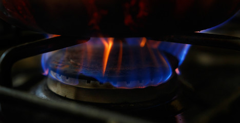 old smoked kettle on a gas stove