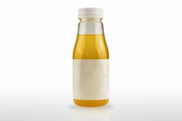 The plastic bottle package containing the product has a white label isolated on white background.