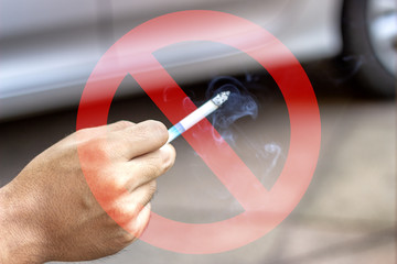 The concept of smoking cessation with male hands is carrying smoke cigarettes drugs, which are harmful to people around and dangerous to their own health, which causes lung cancer.