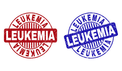 Grunge LEUKEMIA round stamp seals isolated on a white background. Round seals with grunge texture in red and blue colors. Vector rubber watermark of LEUKEMIA caption inside circle form with stripes.