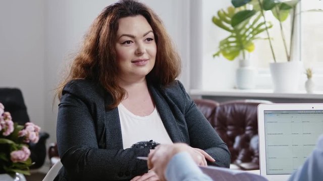 Plus size woman attending job interview