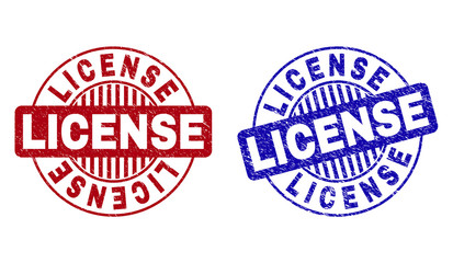 Grunge LICENSE round stamp seals isolated on a white background. Round seals with grunge texture in red and blue colors. Vector rubber imitation of LICENSE text inside circle form with stripes.