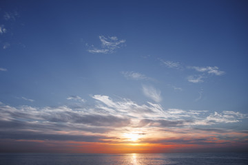 sunrise at ocean seascape with reflection