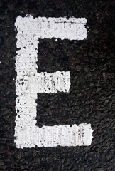  Written Wording in Distressed State Typography Found Letter E